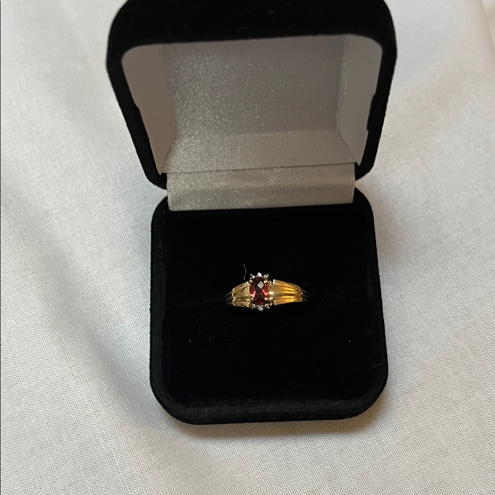 Gold Ring with Red Gemstone